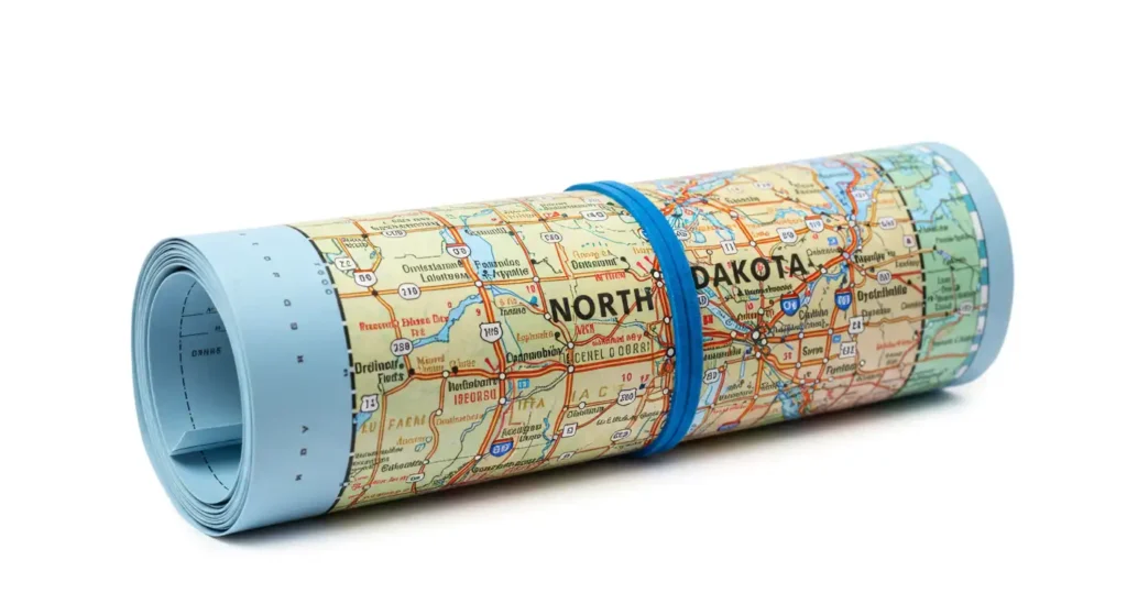 A rolled up North Dakota Map